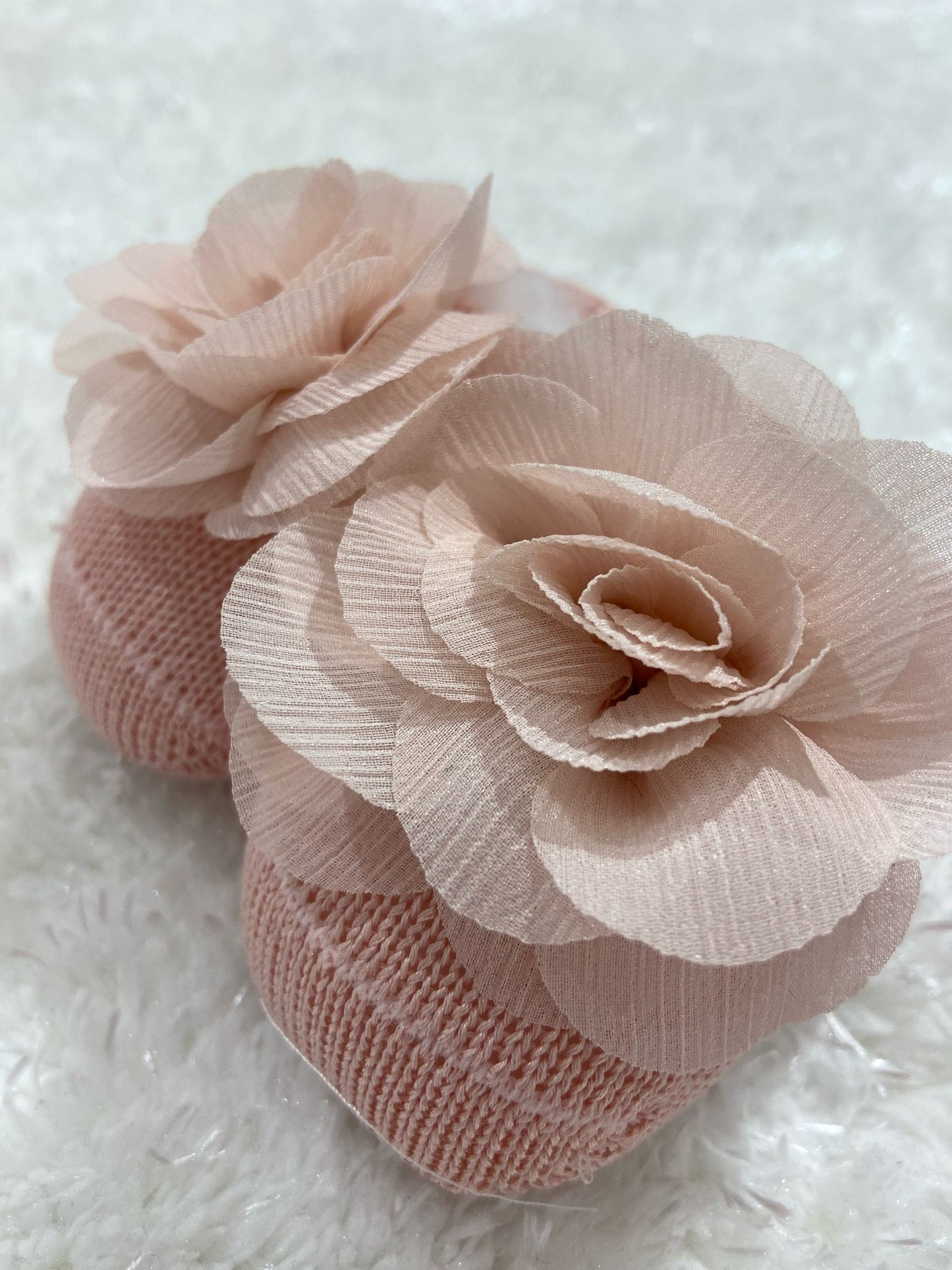 Scarpina di cotone con fiore