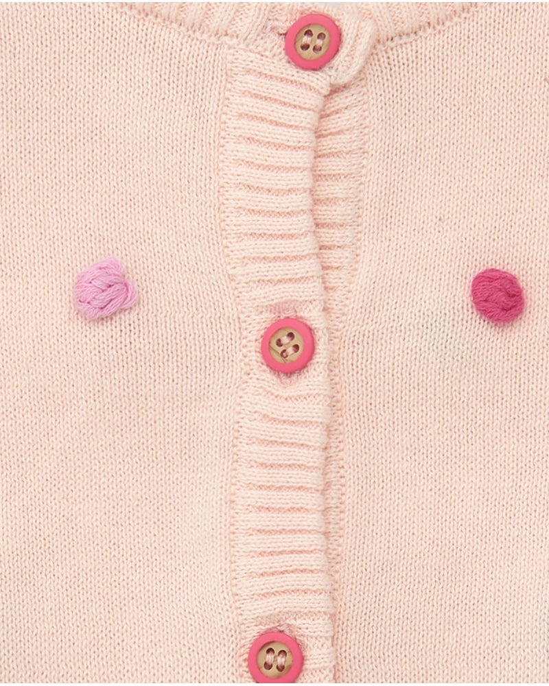 Giacca rosa di maglia per bambina con pompon multicolori e bottoni frontali Tuc tuc